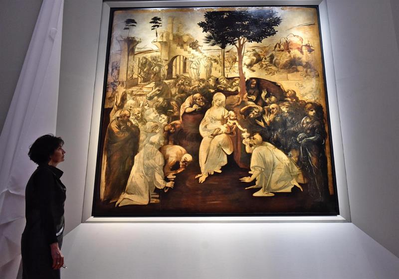 El cuadro "Adoración de los Reyes Magos " (1481) de Leonardo Da Vinci, tras su restauración, en la Galería Uffizi en Florencia.